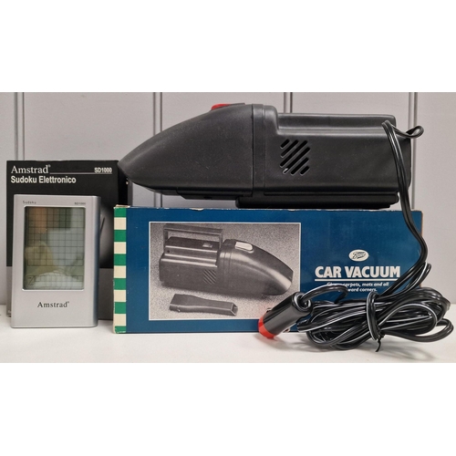 5108 - A mixed lot of three boxed electrical items. A 'Micromark' micro cooler (PAT test pass & functionali... 