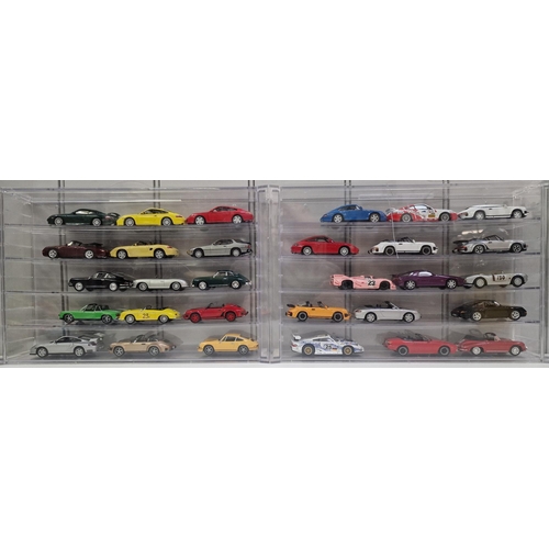 3753 - A collection (appears complete) of 52 DeAgostini Porsche models, with associated magazines (in binde... 