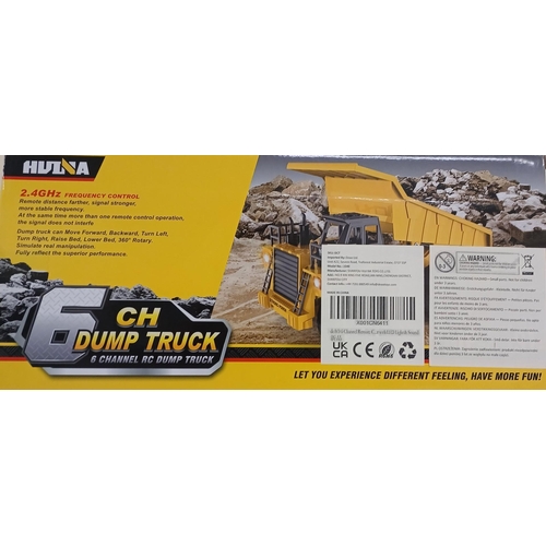 3774 - A boxed, unopened 'Huina' 6 channel remote control dump truck.