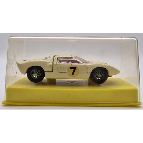 3818 - An early Dinky Ford GT, in box but without cardboard inner. Model no.215.