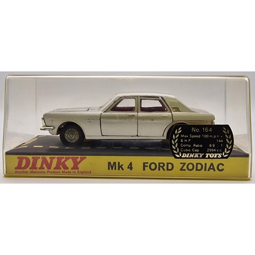 3820 - An original, boxed, late 1960's, Dinky Ford Zodiac MkIV, in silver. Model no. 164.