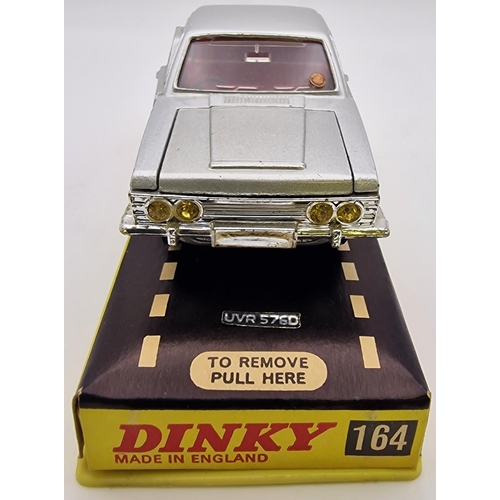 3820 - An original, boxed, late 1960's, Dinky Ford Zodiac MkIV, in silver. Model no. 164.