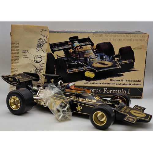 3821 - A boxed, 1:18 scale, original Corgi Lotus John Player Special Formula 1 car. Complete with instructi... 