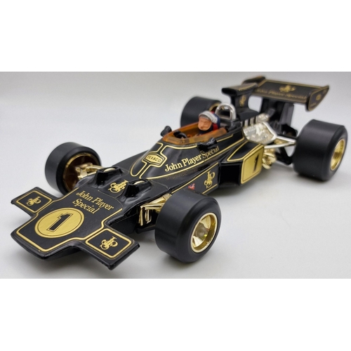 3821 - A boxed, 1:18 scale, original Corgi Lotus John Player Special Formula 1 car. Complete with instructi... 