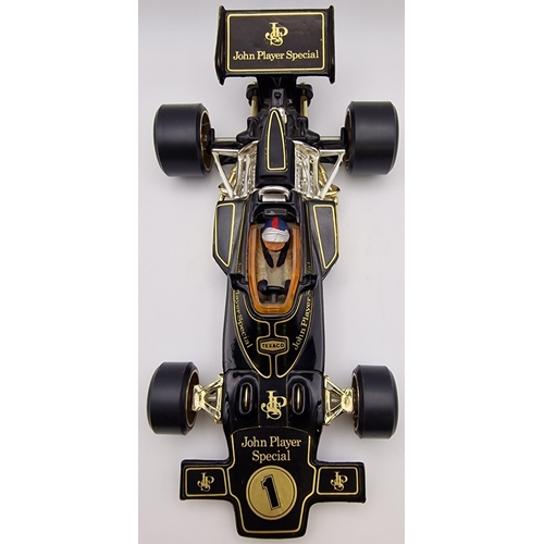 3821 - A boxed, 1:18 scale, original Corgi Lotus John Player Special Formula 1 car. Complete with instructi... 