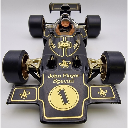 3821 - A boxed, 1:18 scale, original Corgi Lotus John Player Special Formula 1 car. Complete with instructi... 