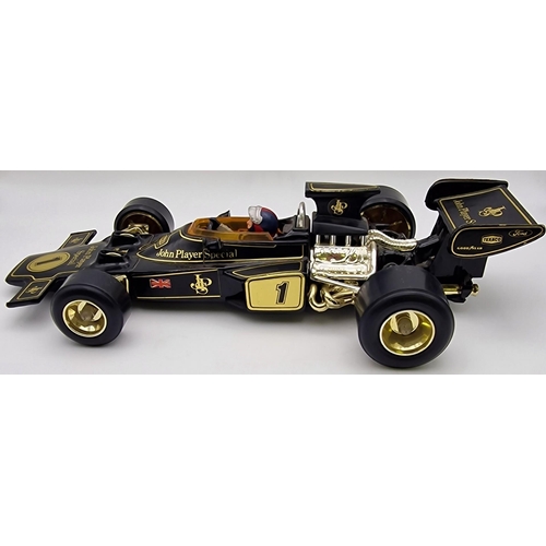 3821 - A boxed, 1:18 scale, original Corgi Lotus John Player Special Formula 1 car. Complete with instructi... 