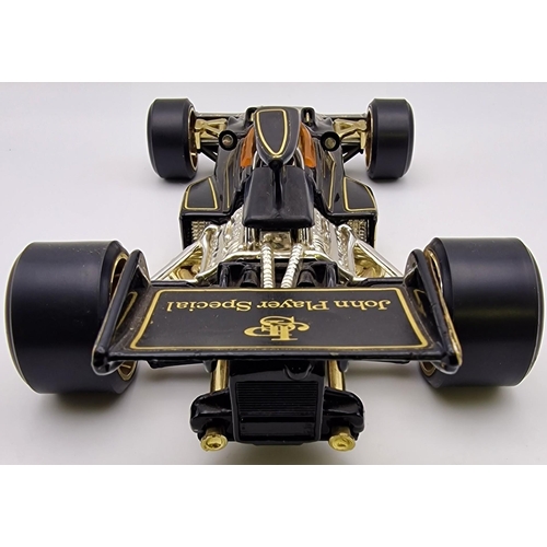 3821 - A boxed, 1:18 scale, original Corgi Lotus John Player Special Formula 1 car. Complete with instructi... 