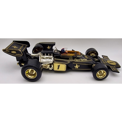 3821 - A boxed, 1:18 scale, original Corgi Lotus John Player Special Formula 1 car. Complete with instructi... 