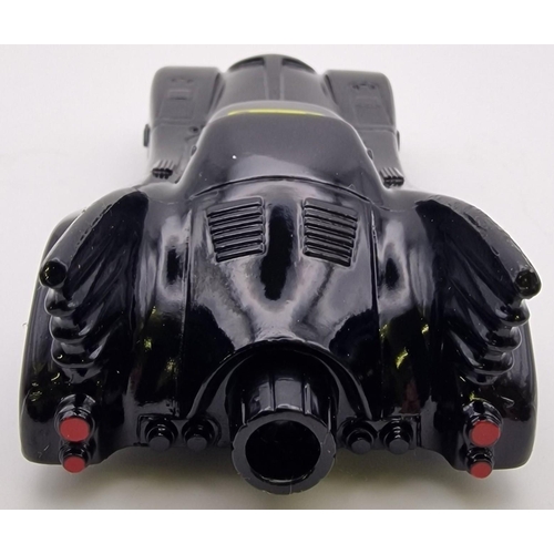 3825 - A carded, 1:43 scale Ertl Batmobile. Model no.2575. Card blister has been opened.