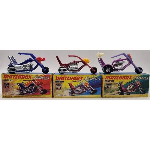 A trio of boxed Matchbox Superfast Choppers models from mid 1970's. To include Stingeroo, in metallic purple, with purple forks; Chop Suey, in metallic red, with red forks & Jumbo Jet, in metallic blue, with blue handlebars. Model no's 38, 49 & 71.