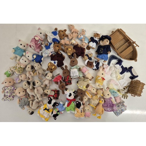 4428 - A collection of approximately 35 unboxed Sylvanian Family figures, many with accessories. To include... 