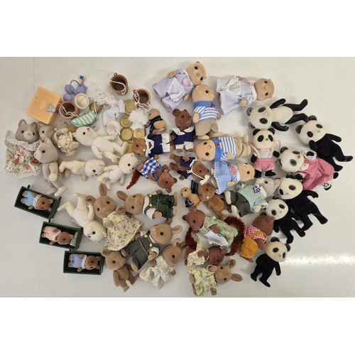 4431 - A collection of approximately 35 unboxed Sylvanian Family figures, many with accessories. To include... 