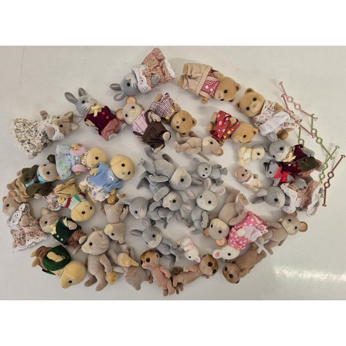 4432 - A collection of approximately 35 unboxed Sylvanian Family figures, many with accessories. To include... 