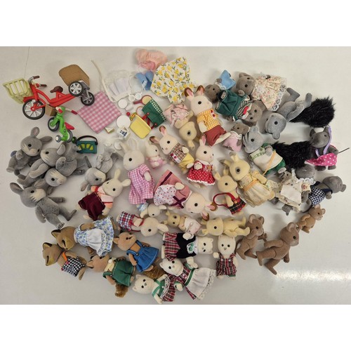 4433 - A collection of approximately 40 unboxed Sylvanian Family figures, many with accessories. To include... 