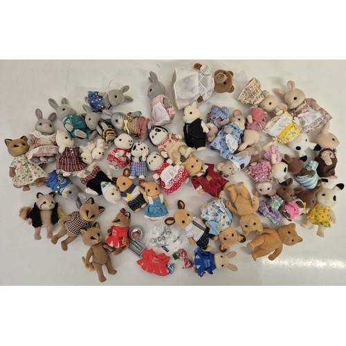 4434 - A collection of approximately 45 unboxed Sylvanian Family figures, many with accessories. To include... 