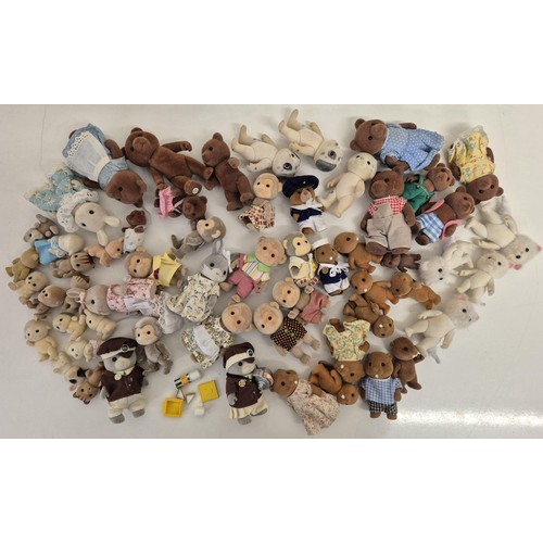 4435 - A collection of approximately 60 unboxed Sylvanian Family figures, many with accessories. To include... 