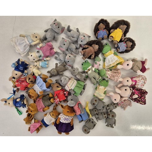 4439 - A collection of approximately 40 unboxed Sylvanian Family figures. To include champagne rabbits, fro... 