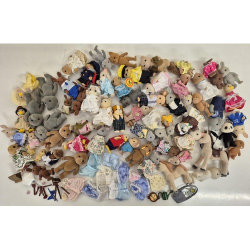 4440 - A collection of approximately 60 unboxed Sylvanian Family figures, many with accessories. To include... 