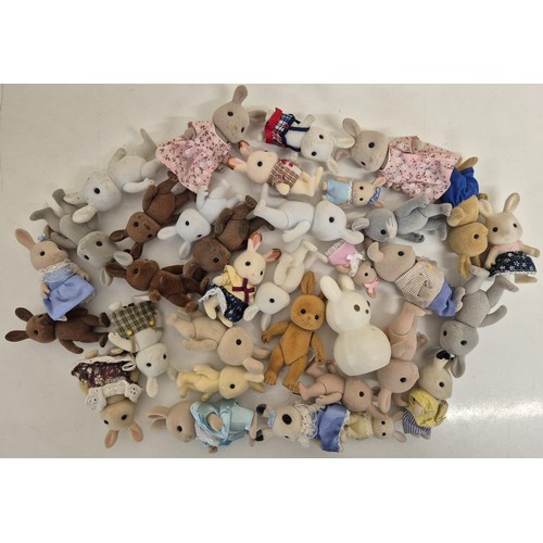 4447 - A collection of approximately 35 unboxed Sylvanian Family rabbit figures.