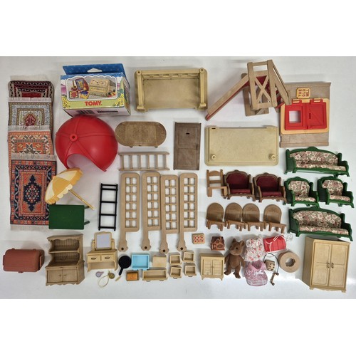 4455 - A large quantity of unboxed Sylvanian Family furniture & accessories, together with an unboxed figur... 