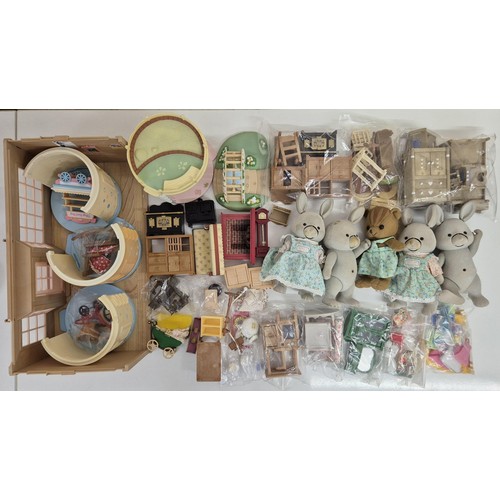 4456 - A large quantity of unboxed Sylvanian Family figures, furniture & accessories.