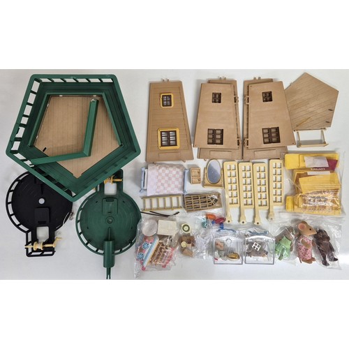 4457 - A large quantity of unboxed Sylvanian Family figures, accessories & windmill (unchecked for complete... 