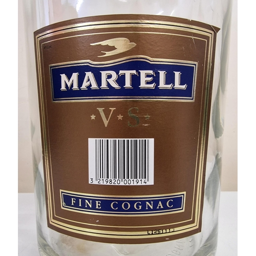 5010 - An empty Rehoboam (4.5 Litre) Martell Cognac Bottle. Height 48cm.