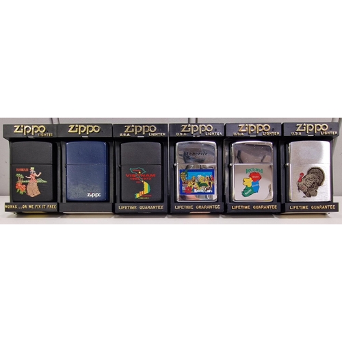 5019 - A collection of ten Zippo lighters, together with a pair of carry cases.