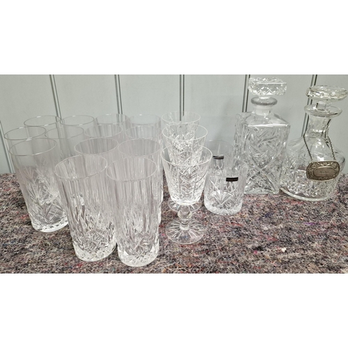 5041 - A collection of crystal drinkware. To include two decanters, Thomas Webb tumblers, etc. Twenty piece... 