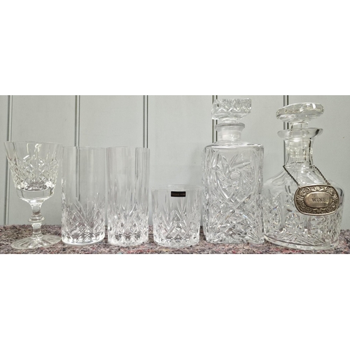 5041 - A collection of crystal drinkware. To include two decanters, Thomas Webb tumblers, etc. Twenty piece... 