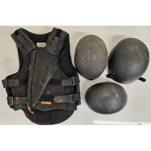 5166 - A selection of used riding gear. To include body & shoulder protector vest & three helmets.