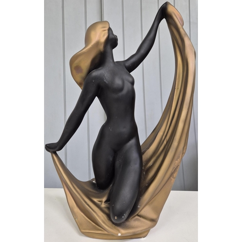 5185 - A large scale, art deco-style figurine. Cast plaster. Height 47cm.