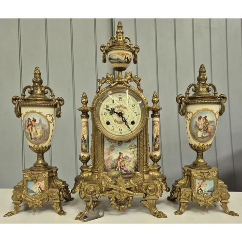 5198 - A late 20th century clock garniture, by Franz Hermle Lancini. Brass cased, with ceramic panelling, d... 