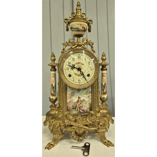 5198 - A late 20th century clock garniture, by Franz Hermle Lancini. Brass cased, with ceramic panelling, d... 