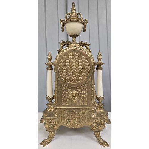 5198 - A late 20th century clock garniture, by Franz Hermle Lancini. Brass cased, with ceramic panelling, d... 