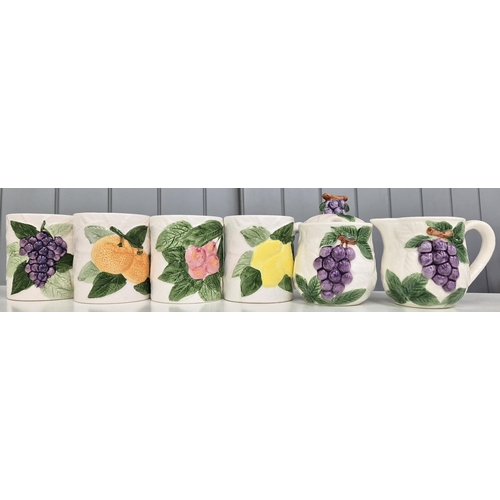 5202 - A nine-piece, Fruit du Jour style tableware set. Tallest 23cm.