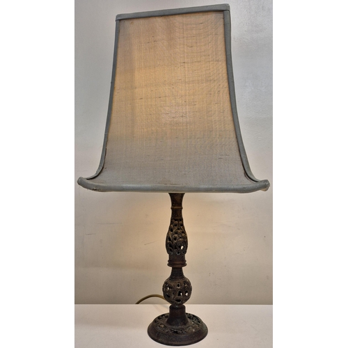 6302 - Two vintage lamps. To include a ceramic example in baluster form, together with a metal-based exampl... 