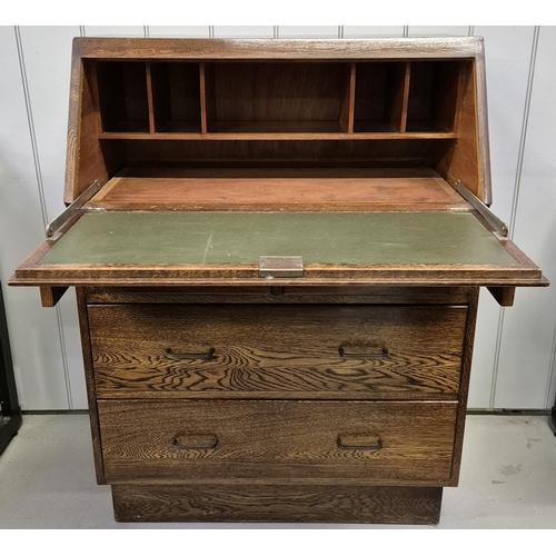 6308 - A vintage walnut bureau. Features fall front, partially fitted interior & two over three drawers. Di... 