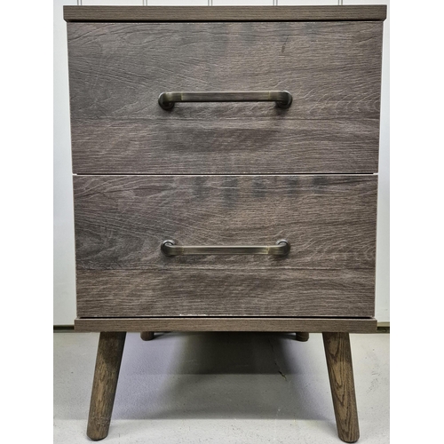 6310 - A contemporary, oak 2-drawer bedside table, with splayed legs. Dimensions(cm) H62, W43, D44.