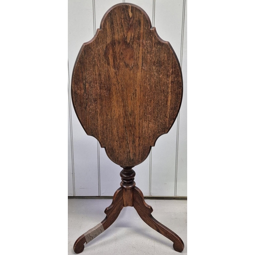 6314 - A vintage mahogany occasional table, with tilt mechanism (damage to leg), together with a piecrust t... 