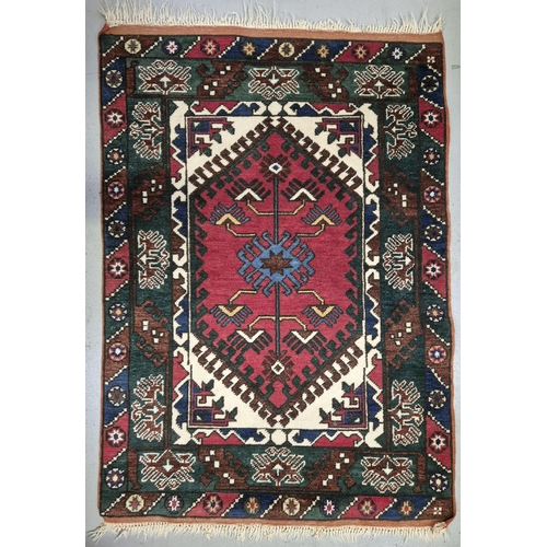 6316 - A fringed, geometric-pattern, Turkish rug. Dimensions 141cm x 93cm.