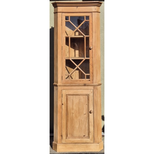 6330 - A solid pine corner display cabinet. Dimensions(cm) H198, W72, D34.