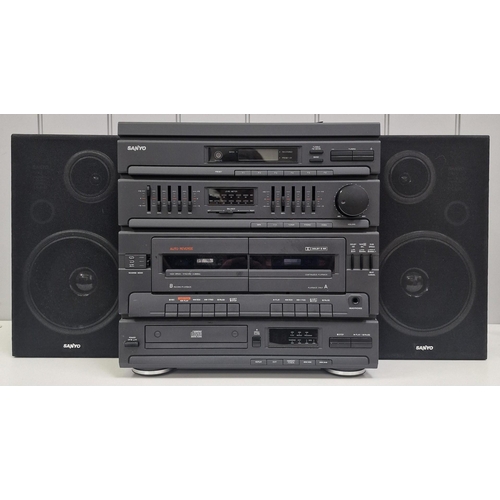 5081 - A Sanyo Hi-Fi system, model no. SX-892. Turntable (cover present but damaged hinge), amp, twin casse... 