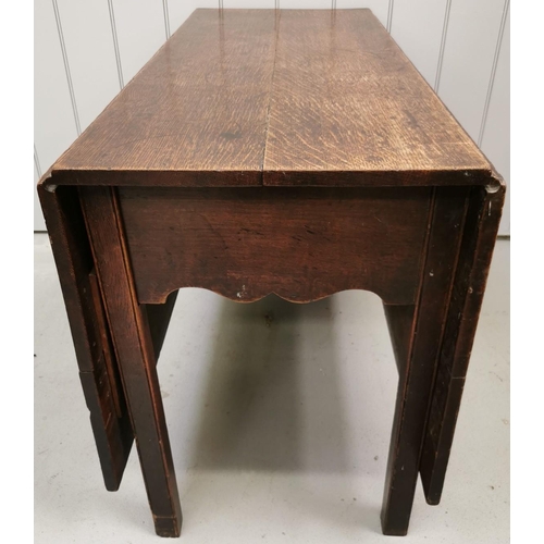 5059 - An early 20th century, oak gateleg table. Dimensions(cm) H72, W51/152, D112