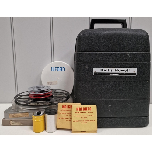 5210 - A vintage 8mm film projector & accessories, by 'Bell & Howell'. Modle no. 256EX. Will require wiring... 
