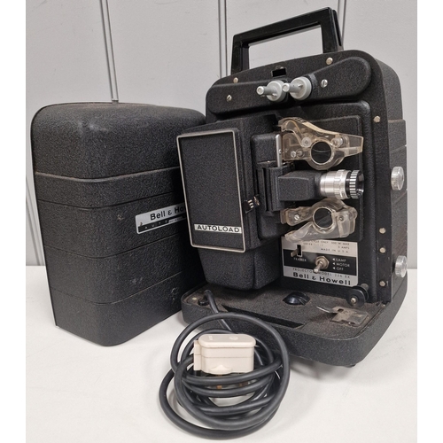 5210 - A vintage 8mm film projector & accessories, by 'Bell & Howell'. Modle no. 256EX. Will require wiring... 