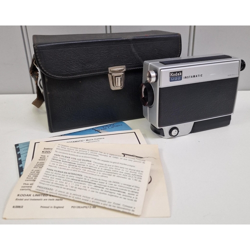 5215 - A mixed lot of photography equipment. To include Polaroid SX-70 instamatic camera, Kodak M22 movie c... 