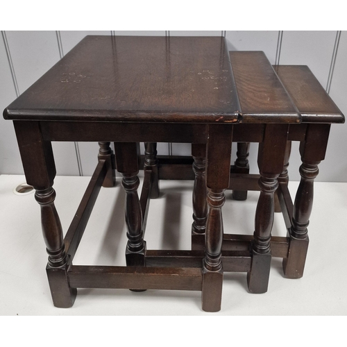 6108 - A vintage, oak nest of three tables. Largest dimensions(cm) H47, W51, D39.