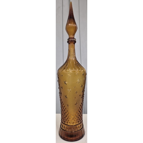 5224 - A vintage, oversized, Empoli Amber glass Genie Bottle/Decanter. Height 57.5cm.